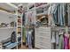 Organized walk-in closet with shelving and drawers at 8740 Ingleton Ct, Orlando, FL 32836