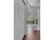Hallway featuring a partial view of a bathroom at 8740 Ingleton Ct, Orlando, FL 32836