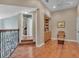 Spacious hallway with hardwood floors and room to create your own space at 8740 Ingleton Ct, Orlando, FL 32836