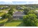 Beautiful home with screened-in pool area and view of lake at 1091 Hampstead Ln, Ormond Beach, FL 32174