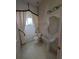 Bathroom showcasing vanity, fixtures, tile flooring, and a curtained window at 1091 Hampstead Ln, Ormond Beach, FL 32174