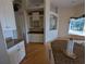Bright kitchen with breakfast bar featuring granite countertops and ample storage space at 1091 Hampstead Ln, Ormond Beach, FL 32174