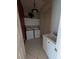 Functional laundry room features a washer, dryer, sink, and ample storage cabinets at 1091 Hampstead Ln, Ormond Beach, FL 32174