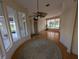 Open concept living space featuring hardwood floors, neutral paint, and natural light throughout at 1091 Hampstead Ln, Ormond Beach, FL 32174