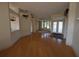 Spacious, light-filled living room featuring hardwood floors and an open floor plan at 1091 Hampstead Ln, Ormond Beach, FL 32174