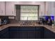 Updated kitchen featuring granite countertops, stainless steel appliances, and modern cabinetry at 15 Estrella Rd, Debary, FL 32713