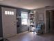 Cozy living room with tile flooring, built-in shelving, and natural light at 15 Estrella Rd, Debary, FL 32713