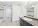 Bathroom with a large mirror, vanity, toilet, and shower/tub combination at 3480 Soho St # 107, Orlando, FL 32835