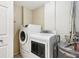 Laundry room featuring a modern washer and dryer set at 3480 Soho St # 107, Orlando, FL 32835