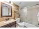 Neutral bathroom features modern sink, vanity, ladder towel rack, and shower-tub combo at 4139 S Atlantic Ave # B707, New Smyrna Beach, FL 32169