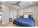 Nicely furnished bedroom with queen bed, desk, recessed lighting, and ample closet space at 4139 S Atlantic Ave # B707, New Smyrna Beach, FL 32169
