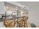 Bright kitchen features stainless steel appliances and breakfast bar at 4139 S Atlantic Ave # B707, New Smyrna Beach, FL 32169