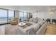 Cozy living room with ocean views, comfortable seating, and stylish decor at 4139 S Atlantic Ave # B707, New Smyrna Beach, FL 32169