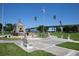 Scenic park with benches, monument, bridge, and lush greenery, perfect for relaxation and recreation at 4139 S Atlantic Ave # B707, New Smyrna Beach, FL 32169