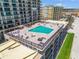 Attractive rooftop pool area offering a refreshing escape with ample seating and stunning views at 4139 S Atlantic Ave # B707, New Smyrna Beach, FL 32169