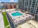 Charming rooftop pool and lounge area, perfect for enjoying sunny days and refreshing swims at 4139 S Atlantic Ave # B707, New Smyrna Beach, FL 32169