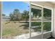 Relaxing back porch with a view of the lush backyard at 4306 Pebblestone Ct, Orlando, FL 32826