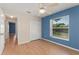 Cozy bedroom with a closet, laminate flooring, and plenty of natural light at 4306 Pebblestone Ct, Orlando, FL 32826