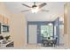 Bright dining nook adjacent to the kitchen, featuring a table and window at 4306 Pebblestone Ct, Orlando, FL 32826