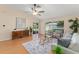 Spacious living room with hardwood floors, plenty of natural light, and modern décor at 4306 Pebblestone Ct, Orlando, FL 32826