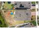 Aerial view of a home with a spacious backyard, patio, and a well-maintained lawn in a suburban neighborhood at 5637 Beggs Road, St Cloud, FL 34771