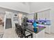 Open-concept kitchen featuring a large island with bar seating and modern appliances at 5637 Beggs Road, St Cloud, FL 34771