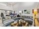 Large living room with high ceilings and plenty of seating at 5637 Beggs Road, St Cloud, FL 34771