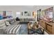 A beautifully furnished living room with a large sectional sofa and modern decor at 5637 Beggs Road, St Cloud, FL 34771