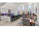 Spacious living space combining kitchen, dining, and living areas with high ceilings and natural light at 5637 Beggs Road, St Cloud, FL 34771