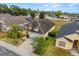 Beautiful home with lush landscaping, paved driveway, and a well-maintained exterior at 650 Old Bridge Cir, Davenport, FL 33897