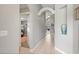 Hallway with stylish architectural details and wall niches, leading to other parts of the home at 650 Old Bridge Cir, Davenport, FL 33897