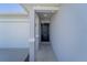 Home featuring a front door with a covered entryway at 820 Overpool Ave, Davenport, FL 33896