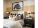 Well-appointed bedroom with decorative pillows and stylish bedside furniture at 9429 Golden Laurel Ln, Orlando, FL 32827
