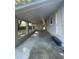 Spacious carport providing covered parking and access to the home's entrance at 969 Chestnut St, Clermont, FL 34711