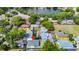 A beautiful neighborhood with a body of water and mature trees surround at 4710 Hatteras Ct, Orlando, FL 32808