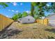 View of backyard with a new wooden fence providing privacy and security at 4710 Hatteras Ct, Orlando, FL 32808