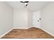 Bedroom featuring wood-look flooring and a ceiling fan at 4710 Hatteras Ct, Orlando, FL 32808