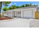 Inviting single-story home featuring a fresh exterior paint job, an attached one-car garage, and meticulous landscaping at 4710 Hatteras Ct, Orlando, FL 32808
