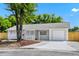 Charming single-story home showcasing a freshly painted exterior, well-manicured landscaping, and a one-car garage at 4710 Hatteras Ct, Orlando, FL 32808