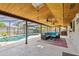 Screened-in lanai with a pool and comfortable seating area for outdoor relaxation at 1026 Manchester Cir, Winter Park, FL 32792