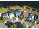 Overhead view of neighborhood homes near lake at 11160 Sylvan Pond Cir, Orlando, FL 32825
