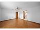 Bright bedroom with wood floors and access to a private bathroom at 11160 Sylvan Pond Cir, Orlando, FL 32825