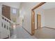 Hallway view of stairs, floors and high ceilings at 11160 Sylvan Pond Cir, Orlando, FL 32825