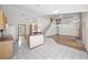 Open-concept living area features vaulted ceilings, and hardwood floors, creating a seamless flow for entertaining at 11160 Sylvan Pond Cir, Orlando, FL 32825