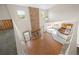 Open living room with high ceilings, brick fireplace, and hardwood floors at 11160 Sylvan Pond Cir, Orlando, FL 32825