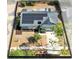 Aerial view of a home with solar panels, a well-manicured lawn, and mature trees at 1134 Shaffer Trl, Oviedo, FL 32765