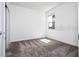 Bright bedroom with a window offers natural light and cozy carpet at 1163 James Paul Rd, Davenport, FL 33837