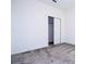 Bedroom features a large closet and neutral walls, ready for personal touch at 1163 James Paul Rd, Davenport, FL 33837