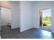 The entryway features tile floors and an open door, showcasing a bright, neutral space at 1163 James Paul Rd, Davenport, FL 33837