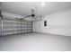 Spacious two car garage with an automatic door, and plenty of room for storage at 1163 James Paul Rd, Davenport, FL 33837